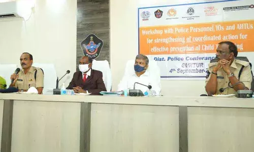 Urban SP RN Ammi Reddy addressing a workshop on effective prevention of child trafficking in Guntur on Friday