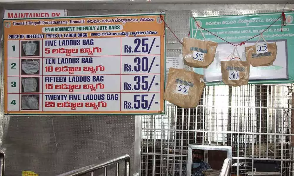 Pilgrims hail distribution of laddus in jute bags