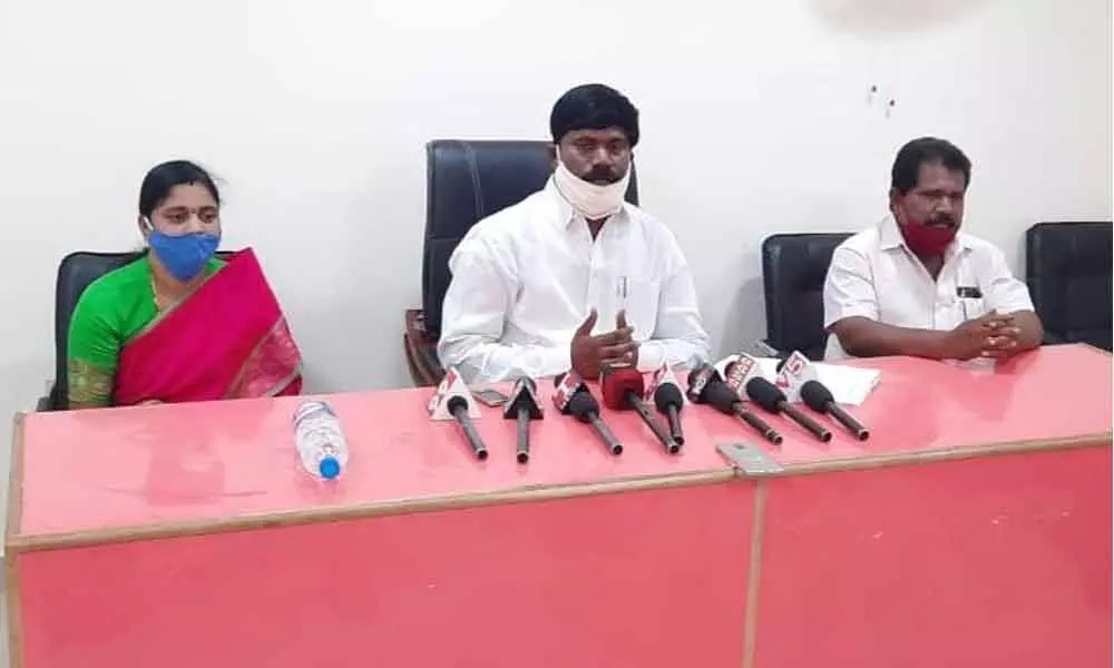 MLA Peddi Sudarshan Reddy addressing a press conference in Narsampet of Warangal Rural district on Friday. TRS Town President Naini Narsaiah also seen