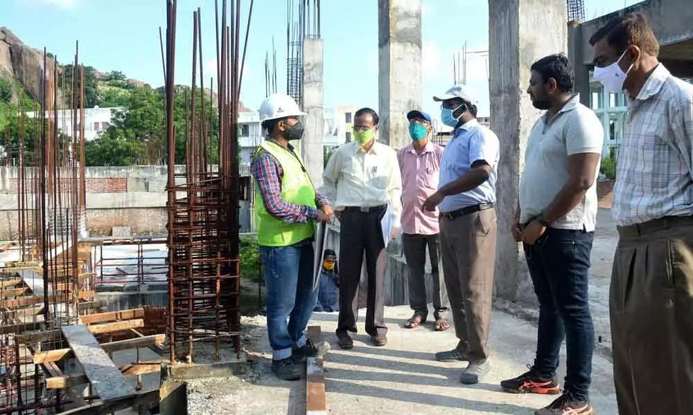 Warangal Urban District Collector Rajeev Gandhi Hanumanthu inspecting the progress of Kaloji Kalakshetram works in Hanamkonda on Friday