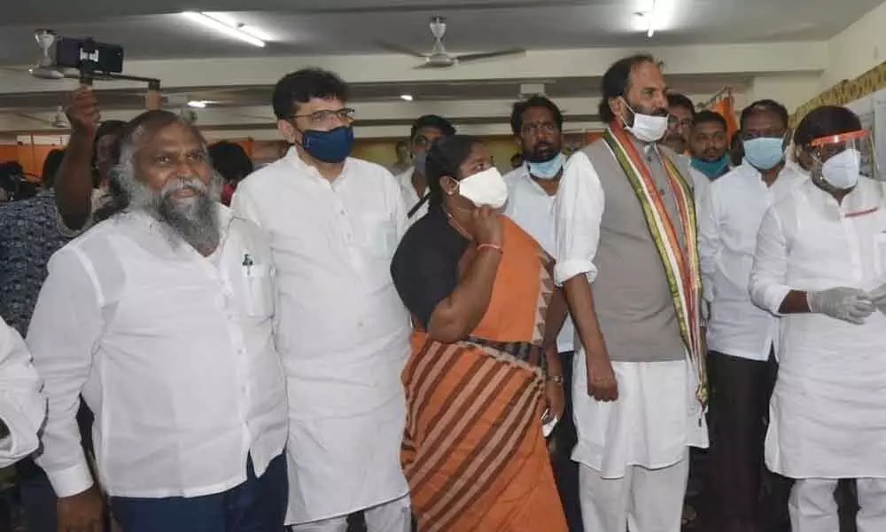CLP leader Bhatti Vikramarka explaining to the party men through a photo exhibition which was launched at Indira Bhavan in Hyderabad on Saturday
