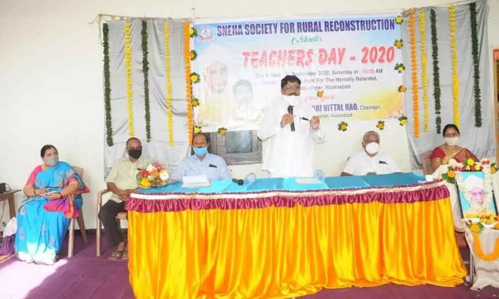 Chairman of Zilla Parishad D Vittal Rao speaking at Teachers Day celebrations held in Sneha Society for Rural Reconstruction Special School for the Mentally Retarded at Maruthi Nagar on Saturday