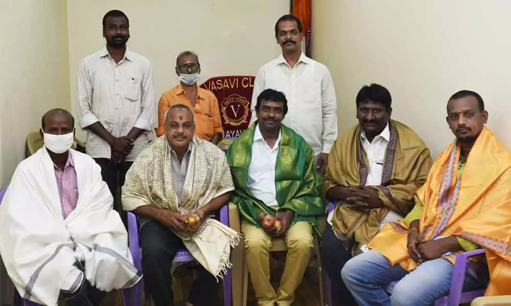 Journalists and photographers felicitated by Vasavi Club of Vidyadharapuram in Vijayawada on Sunday