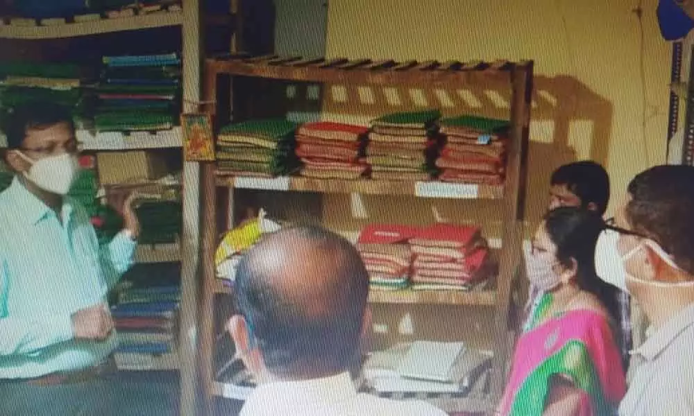 District Collector Vinay Krishna Reddy examining the record room of Tahsildar office in Munagala on Monday