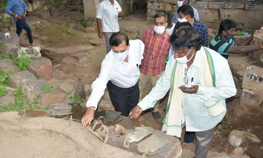 Srisailam Temple Executive Officer K S Rama Rao and other officials inspecting the Ghanta Mutt where 28 copper inscriptions were detected, on Monday