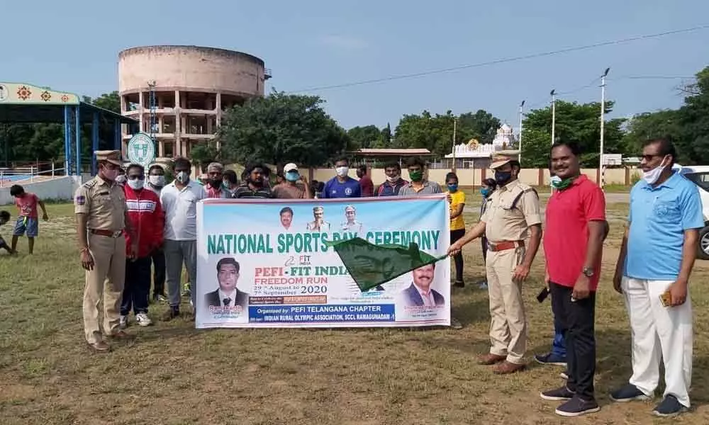 ACP Umender flagging off Fit India programme at Singareni Jawaharlal Nehru Stadium in Godavarikhani on Monday