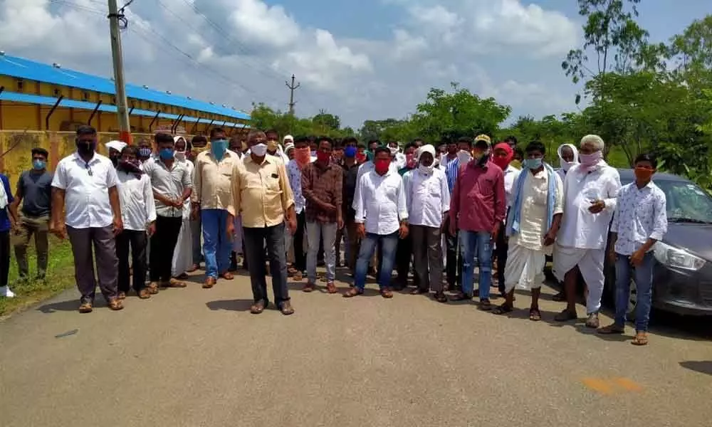 Pedda Gujjul Thanda people staging a protest at Kamareddy district Collectorate on Monday