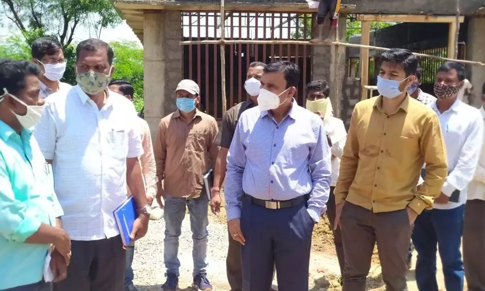 District Collector Dr A Sharath inspecting the construction of Rythu Vedika building in Baswapur on Tuesday