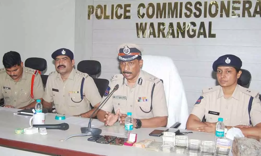 Commissioner of Police P Pramod Kumar disclosing the details of murder mystery in Warangal on Wednesday