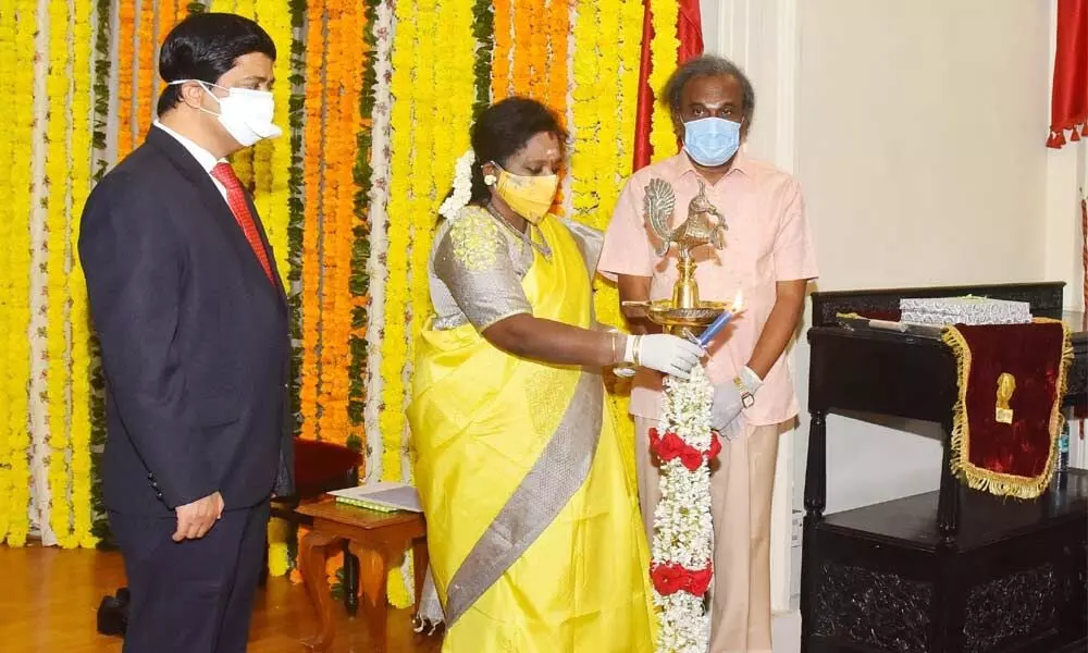 Governor Tamilisai Soundararajan lighting a lamp marking the beginning of her second year in office at Raj Bhavan in Hyderabad on Wednesday