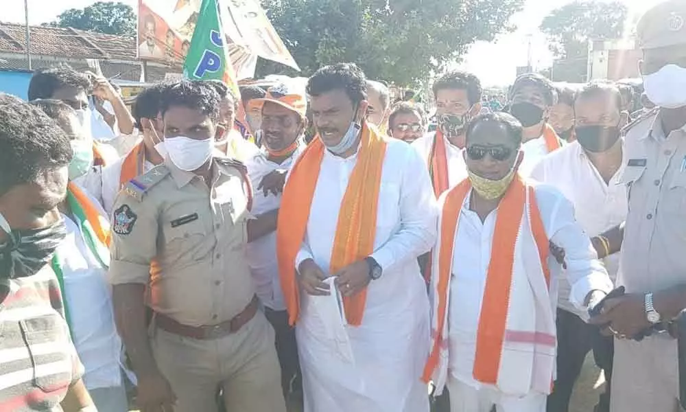 BJP MLC P V N Madhav being taken into custody during a protest in Visakhapatnam on Wednesday