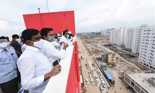 Speaker Pocharam Srinivas Reddy, KTR inspect 2BHKs at Kollur