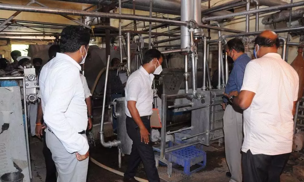Members of Amul delegation vising the Godavari Dairy in Rajamahendravaram on Thursday
