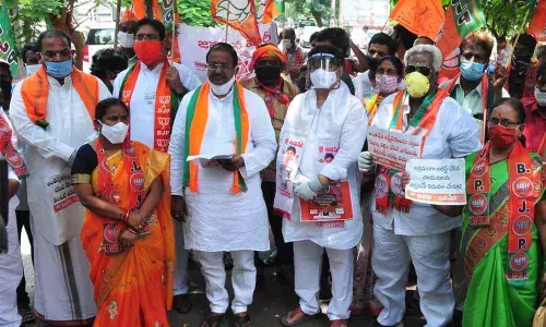 BJP State president Somu Veerraju participating in a dharna at the Sub-Collector’s office in Rajamahendravaram on Friday