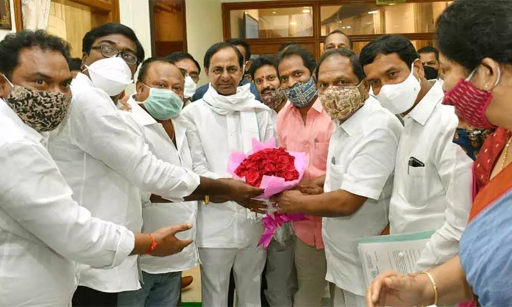 Several Ministers and legislators congratulating Chief Minister K Chandrashekar Rao following passage of the Revenue Bill in Assembly on Friday