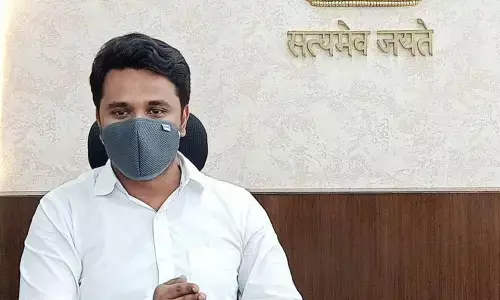 VMC Commissioner Prasanna Venkatesh addressing a media conference at his chamber in Vijayawada on Saturday