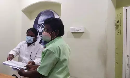 APCC president Dr S Sailajanath handing over the documentary evidence to a member of Legal Service Authority sent by the AP High Court at Andhra Ratna Bhavan in Vijayawada on Saturday