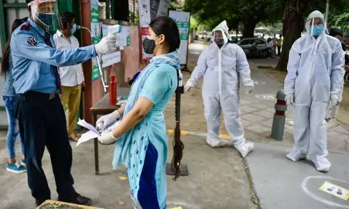 Students write NEET amid strict Covid protocols