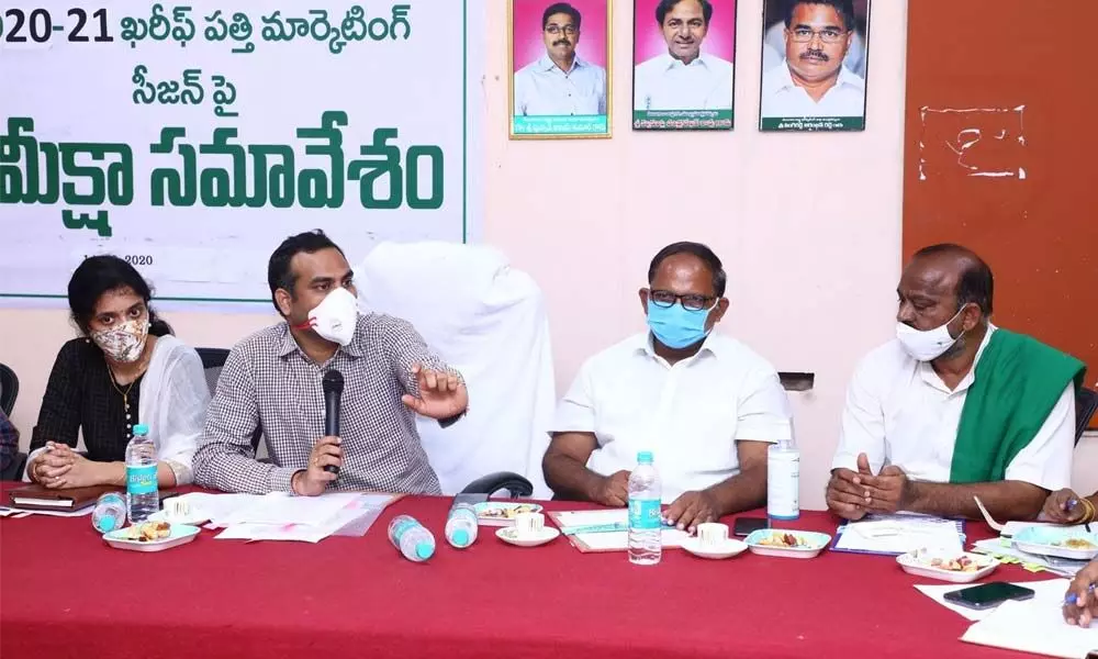 District Collector RV Karnan discussing arrangements for cotton procurement at a review meeting in Khammam on Monday