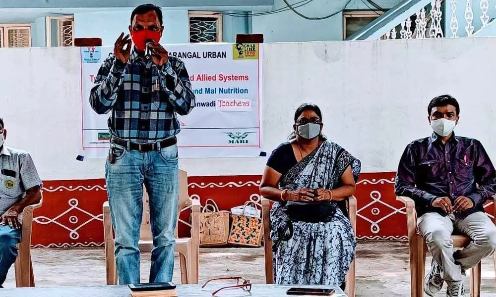 CWC Chairperson Mandala Parashuramulu speaking at a training programme on Child Marriage and Malnutrition organised by the Childline-1098 in Warangal on Monday