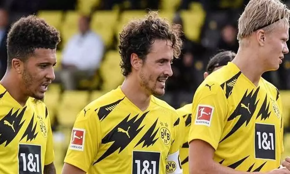 Dortmund thrash 10-man Duisburg in German Cup