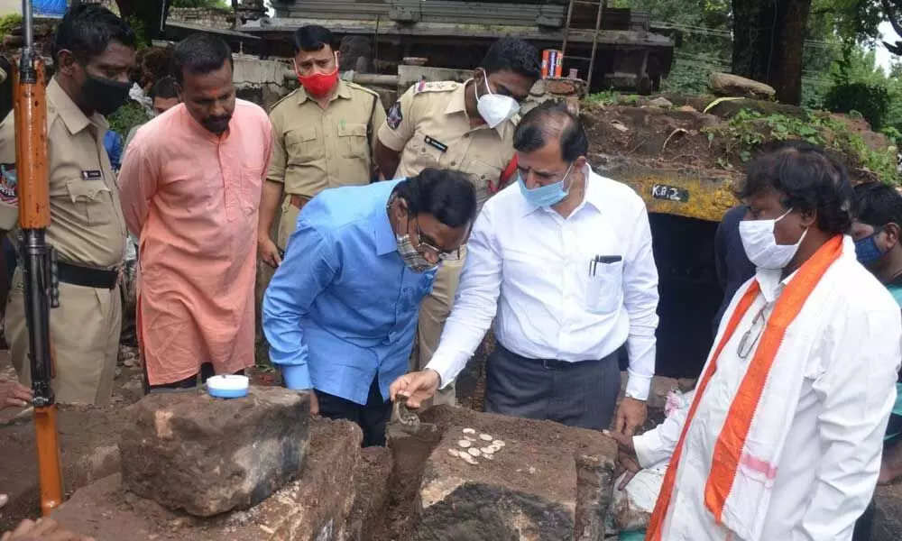 Srisailam temple EO K S Rama Rao inspecting the ancient treasure unearthed at Ghanta Mutt on Tuesday