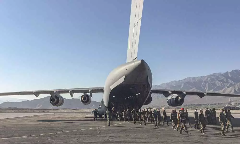 An IAF transport aircraft C17 brings in essentials supplies at a base in Ladakh on Tuesday, as the security forces gear up for winter amid tensions at the LAC