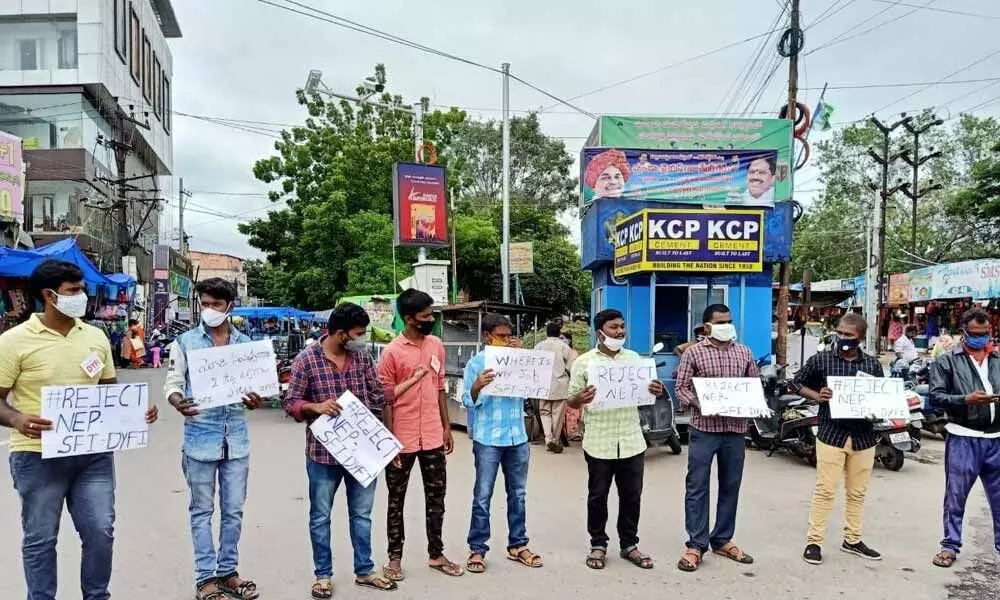 DYFI and SFI activists taking part in a protest in Vijayawada on Tuesday