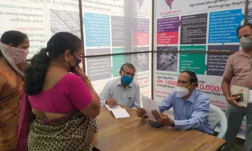 SUDA Chairman Bachu Vijay Kumar interacting with the people during his inspection of help desks in Khammam on Wednesday