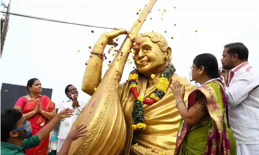Lecturers and students of Sri Venkateswara Music and Dance College garland to the statue of legendary singer M S Subbulakshmi in Tirupati on Wednesday