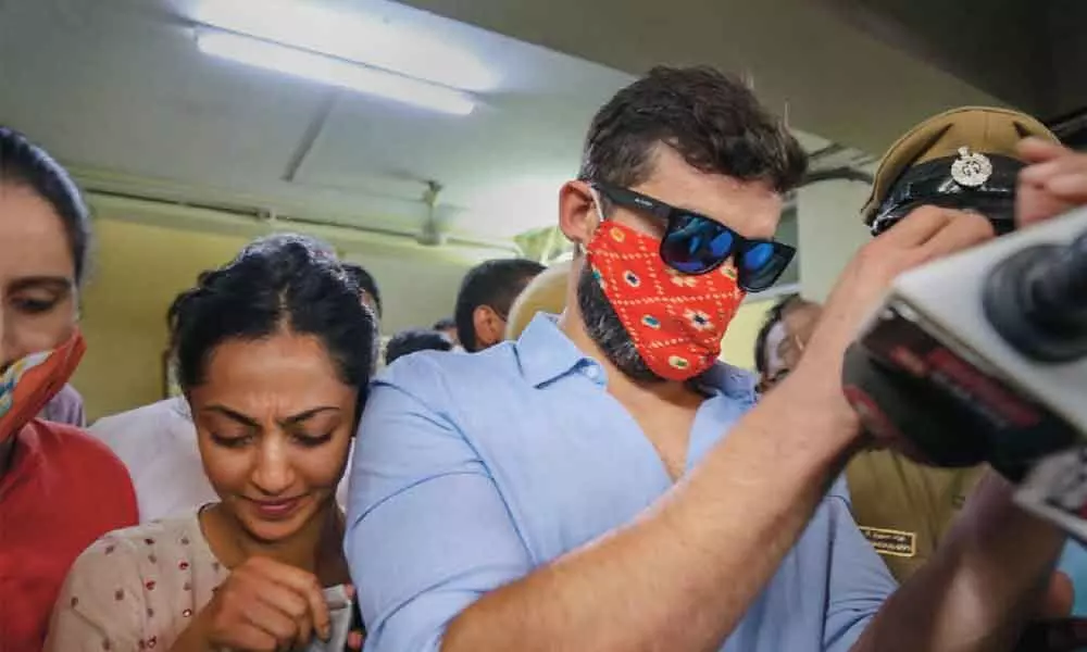 Actor-couple Diganth Manchale and Aindrita Ray appear before the CCB police for questioning in drug racket case in Bengaluru on Wednesday