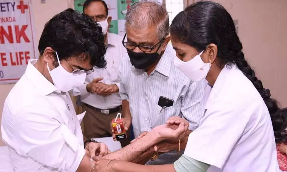 East Godavari District Collector D Muralidhar Reddy donating blood in Kakinada on Wednesday