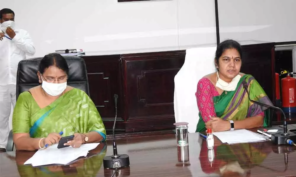 Municipal Commissioner Challa Anuradha addressing a meeting at GMC office in Guntur on Wednesday