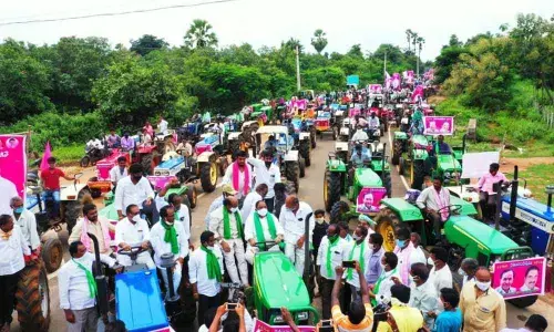 MLA Sandra Venkata Veeraiah leading tractor rally in Vemsoor mandal on Thursday