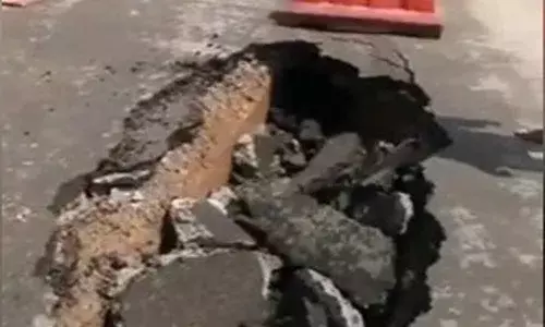 The road in Hyderabads Jubilee Hills that caved in after heavy rain in the city