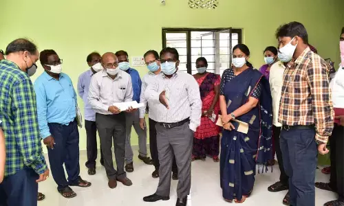 Guntur District Collector I Samuel Anand Kumar visiting a village secretariat at Kattempudi on Friday