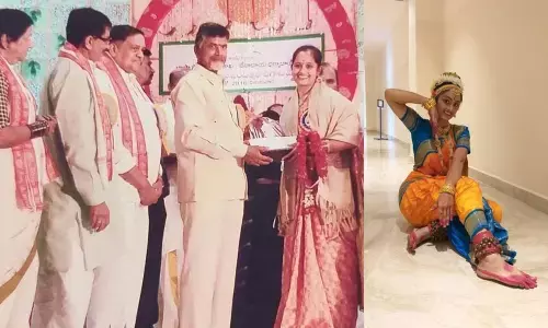 Bhagavathula Sowmya receiving Ugadi Puraskar in 2016 from the then chief minister N Chandrababu Naidu