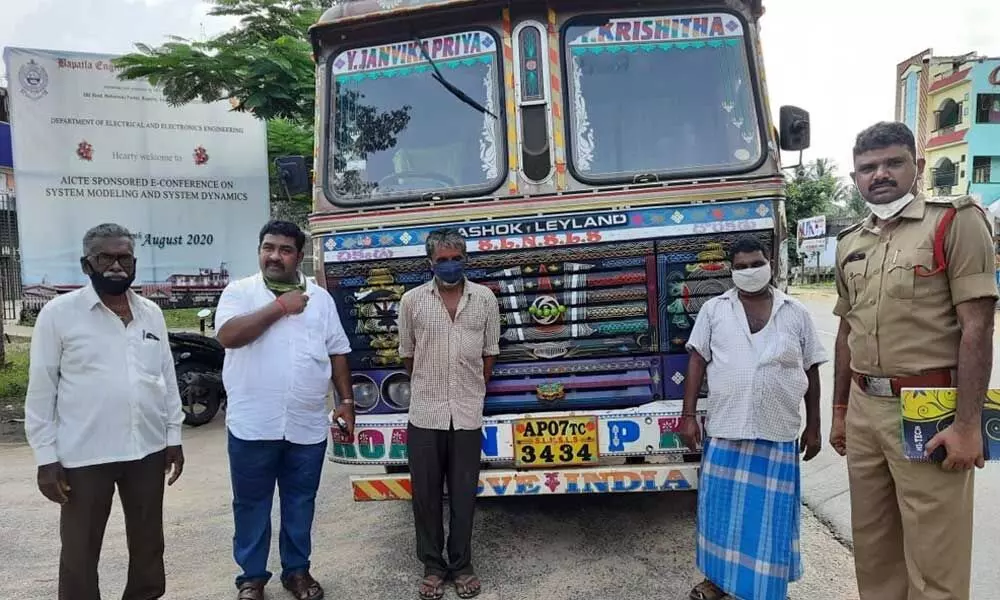 The lorry carrying PDS rice stock seized by police at Cherakupalli in Guntur district on Friday
