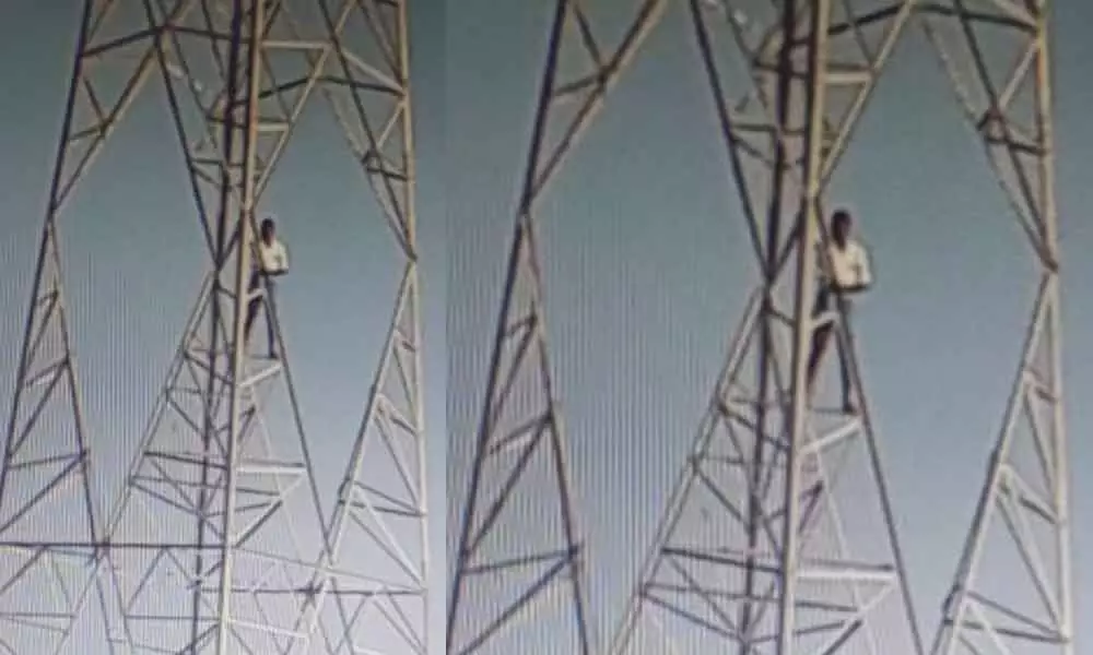 Vexed farmer climbs electric tower for land patta