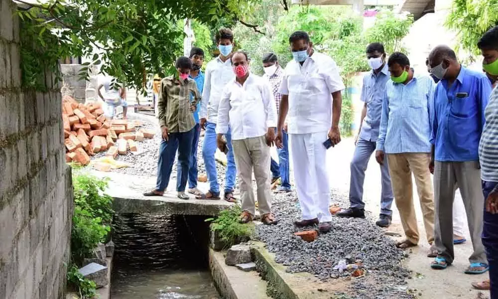 City Mayor Y Sunil Rao inspecting the drainage system in 34th division in Karimnagar on Friday