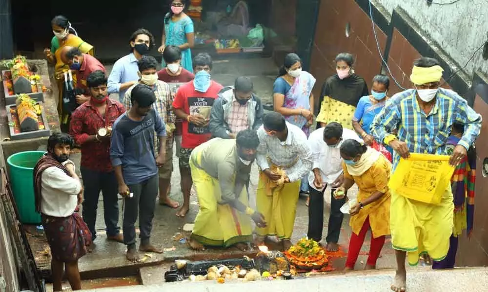 Devotees offering prayers to mark first Saturday of Tamil Peratasi month at Alipiri Padala mandapam in Tirupati