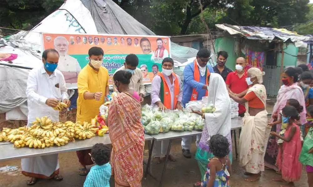 Fruits, bread, biscuits distributed to poor to mark Modi’s birthday