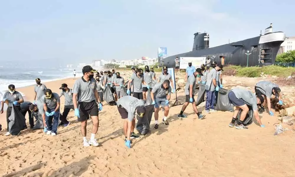 Naval personnel of the Eastern Naval Command taking part in clean-up activity held as a part of the International Coastal Clean-up Day in Visakhapatnam on Saturday