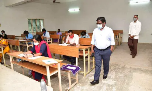 District Collector I Samuel Anand Kumar inspecting a village/ward secretariat staff recruitment examination centre in Guntur on Sunday