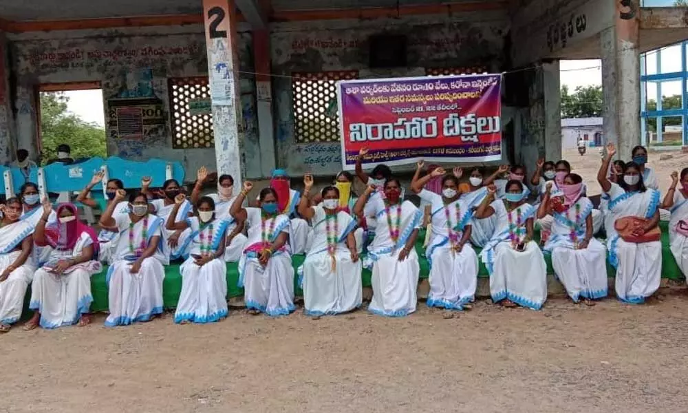 Asha workers participating in hunger strike in Karimnagar on Monday