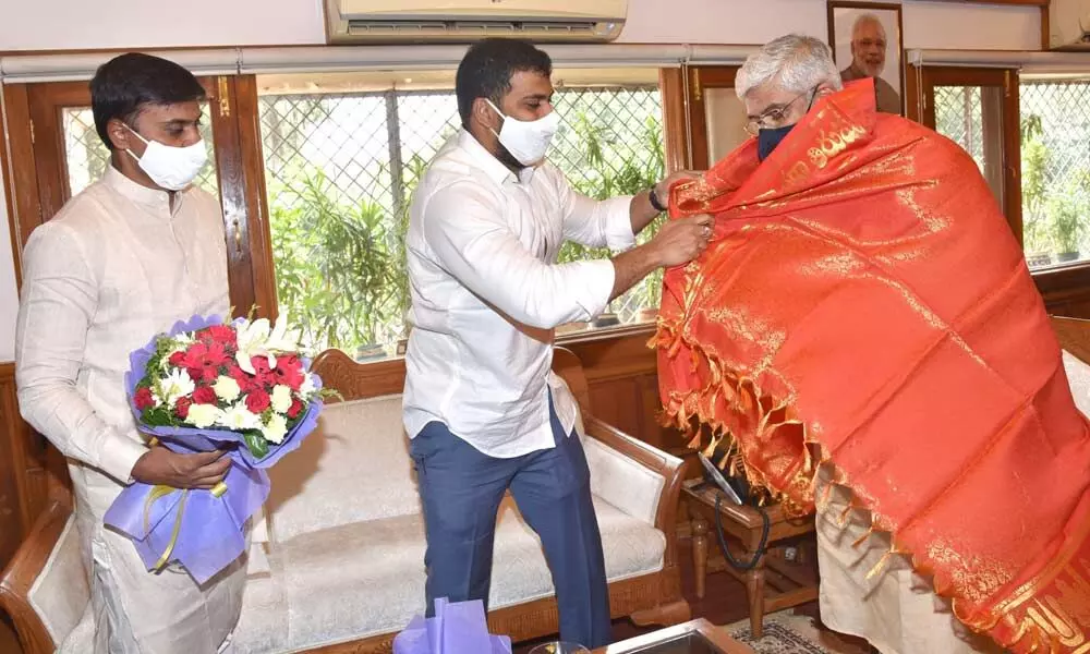 AP Minister of Irrigation P Anil Kumar Yadav felicitating Union Minister for Jal Shakti Gajendra Singh Shekhawat at Shram Shakti Bhavan in New Delhi on Monday