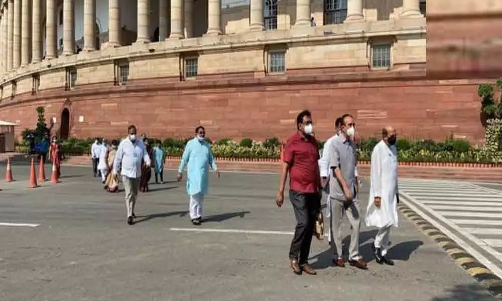 Opposition members in Rajya Sabha stage walkout