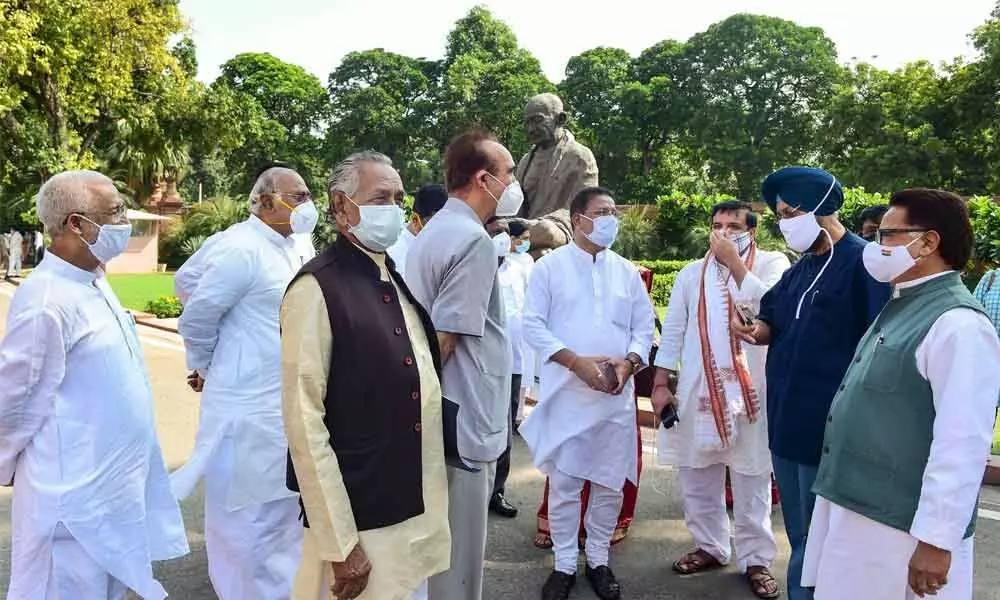 Congress MP Ghulam Nabi Azad and other Opposition MPs after a walkout from the Rajya Sabha