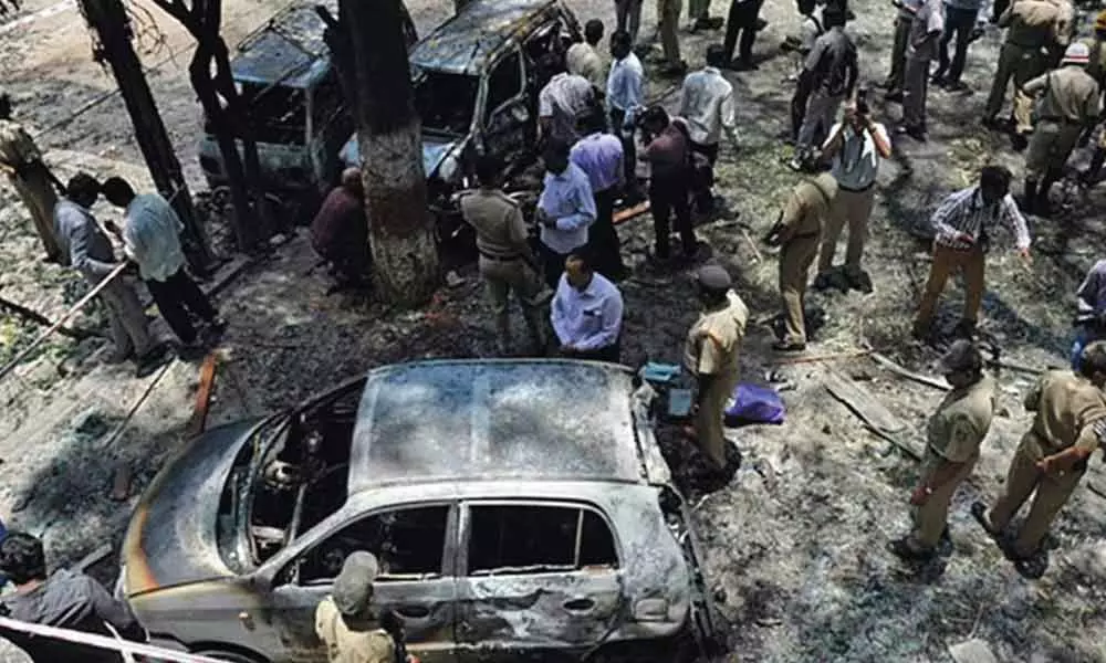 After 12 years of  chase,  city serial blasts accused held in Kerala