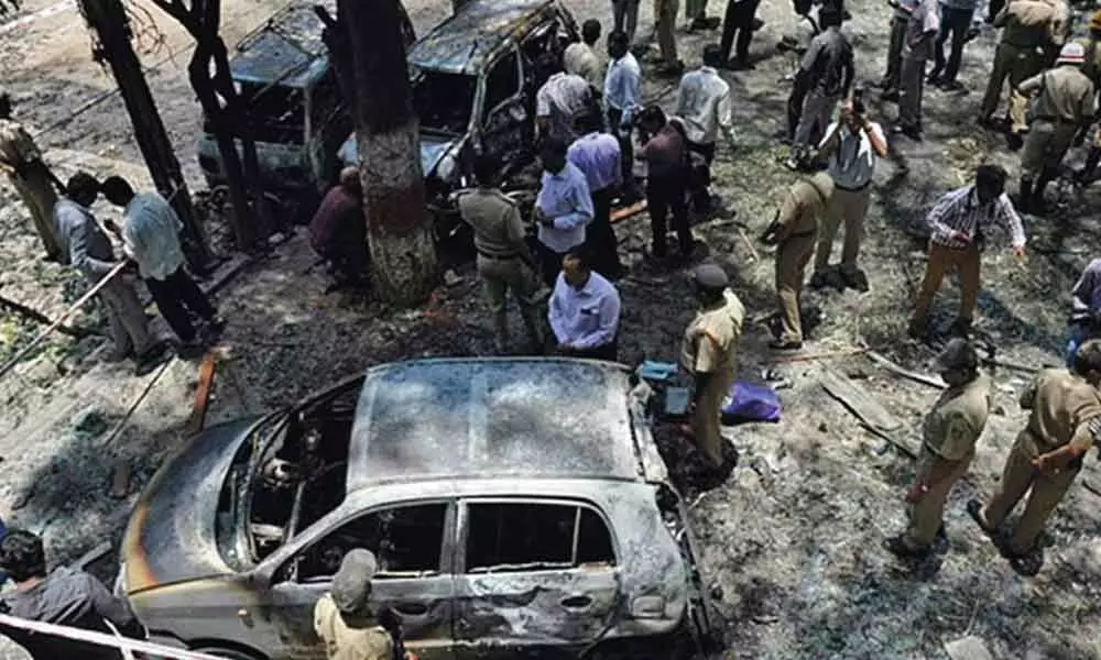 After 12 years of  chase,  city serial blasts accused held in Kerala